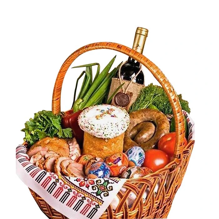 Корзина з пасхою, яйцями та стравами для Великодня